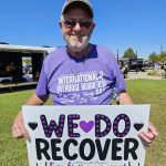 We Do Recover sign