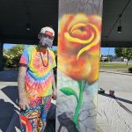 Artistic expression caption with photo of Kyle and rose